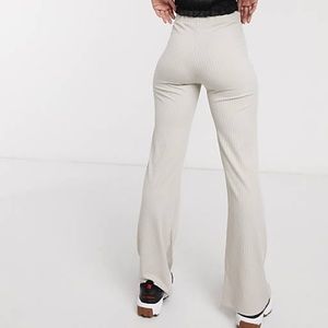 Collusion ribbed flare stretch pants in beige